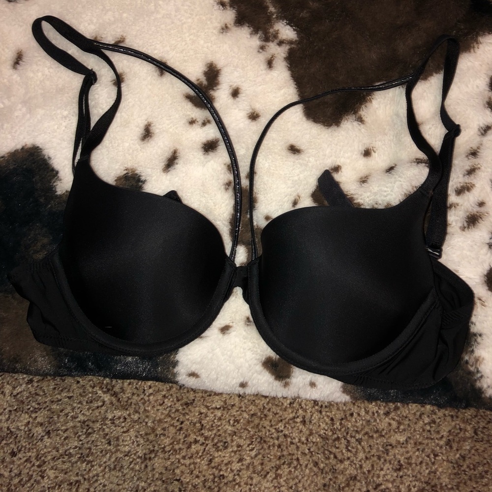 Cup bra with silver straps.